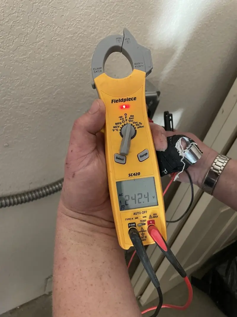 Voltage testing with clamp meter during Hot Tub / Pool Electrical Wiring in Medford Lakes